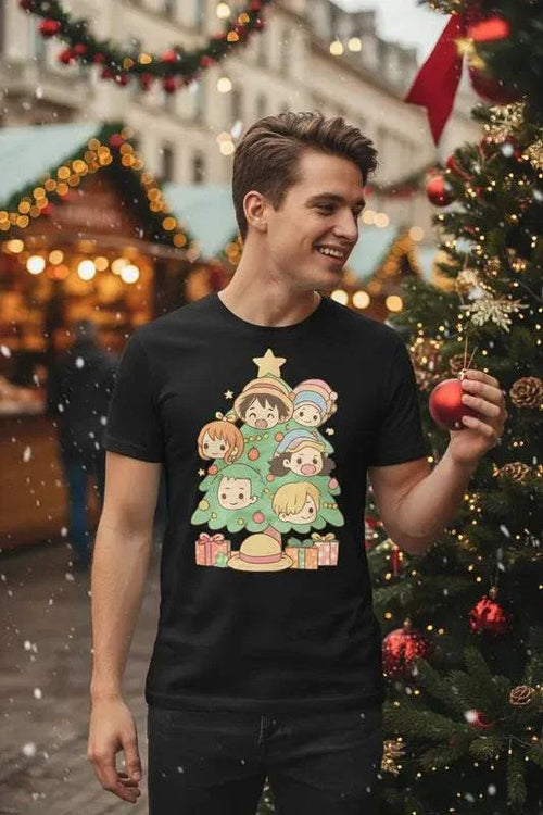 Young man wearing black Luffy Christmas Unisex T-Shirt with festive anime characters design at outdoor holiday market