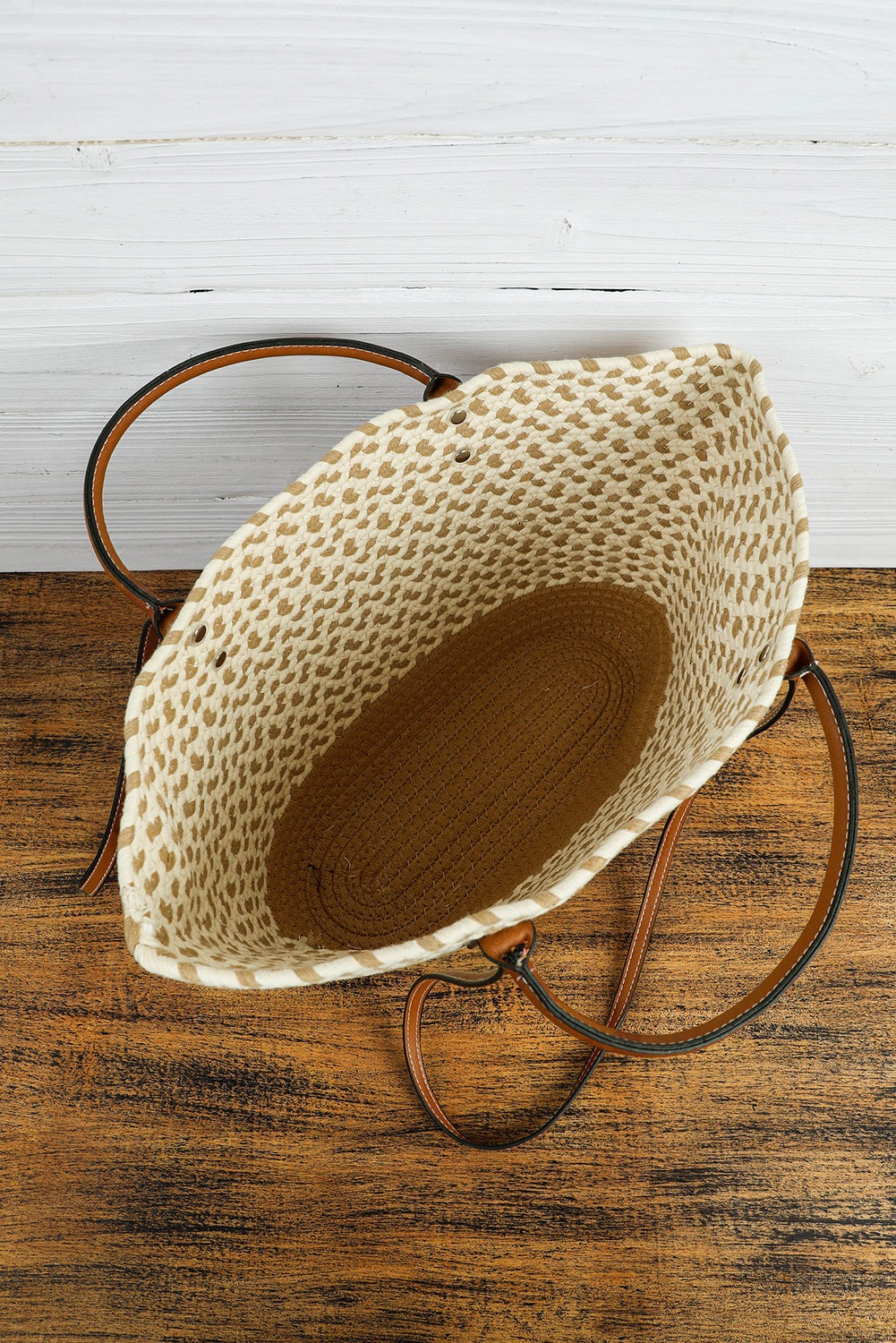 Beige shoulder bag with contrast woven design and PU leather handles, compact size and spacious interior