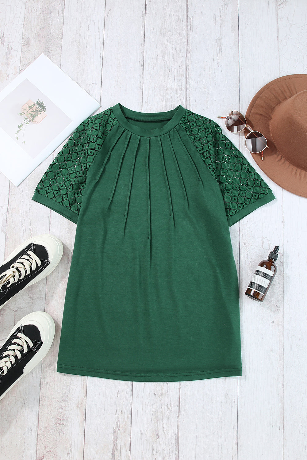 Navy blue raglan sleeve tee with seamed detail and contrast lace design