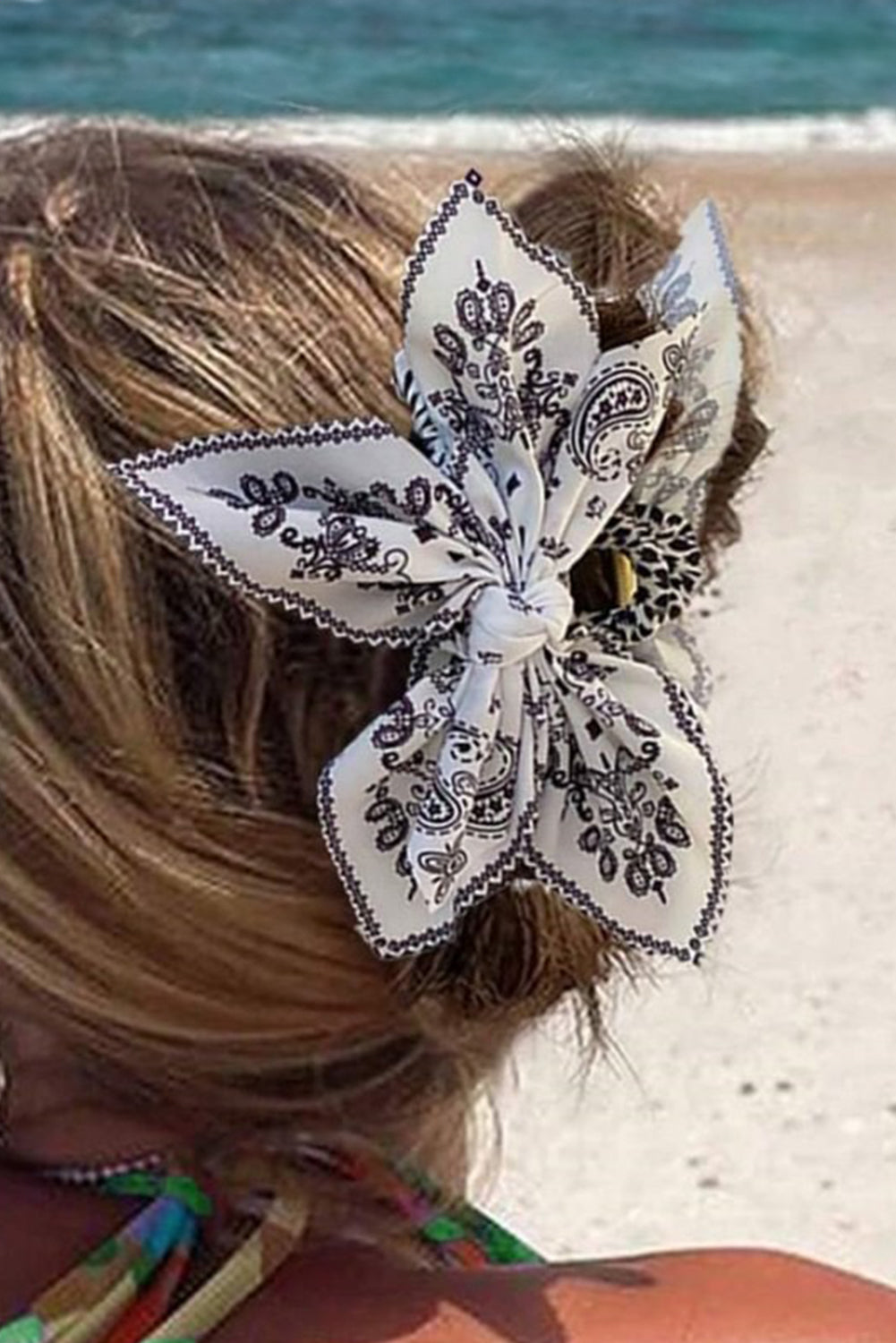 Black paisley floral print bow knot hair clip with stylish pattern and lightweight design