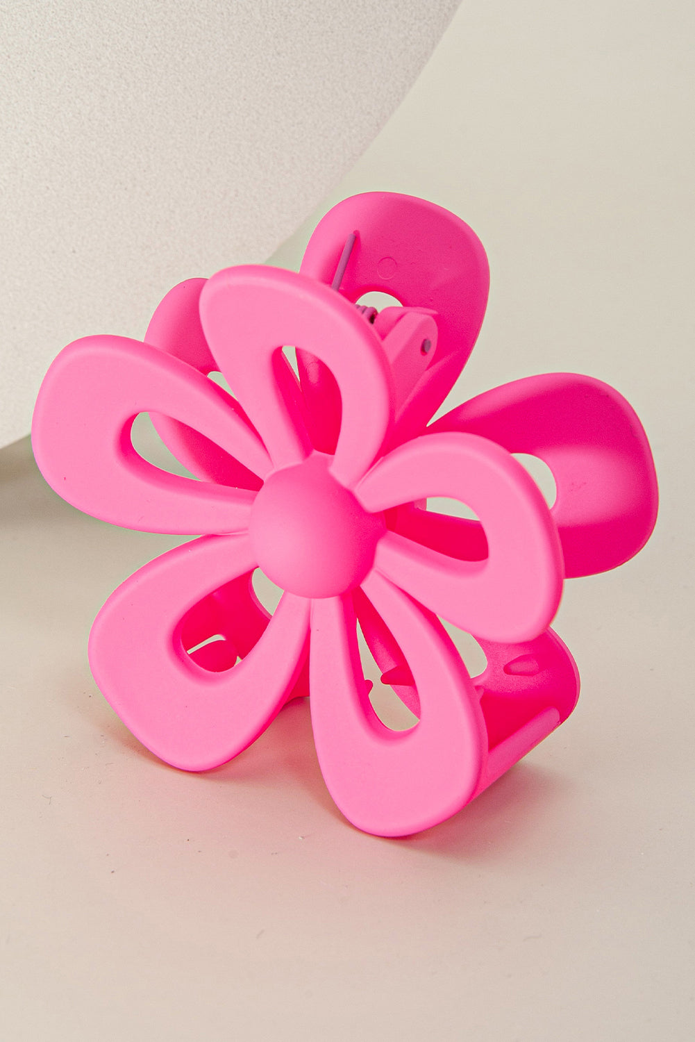 Black sweet hollowed flower shaped claw clip with frosting finish for hair styling