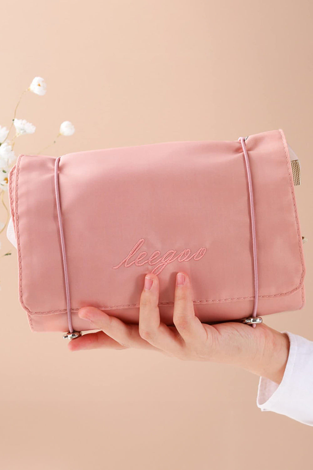 Pink Leegoo detachable 4-in-1 foldable makeup bag with embroidered design and multiple compartments