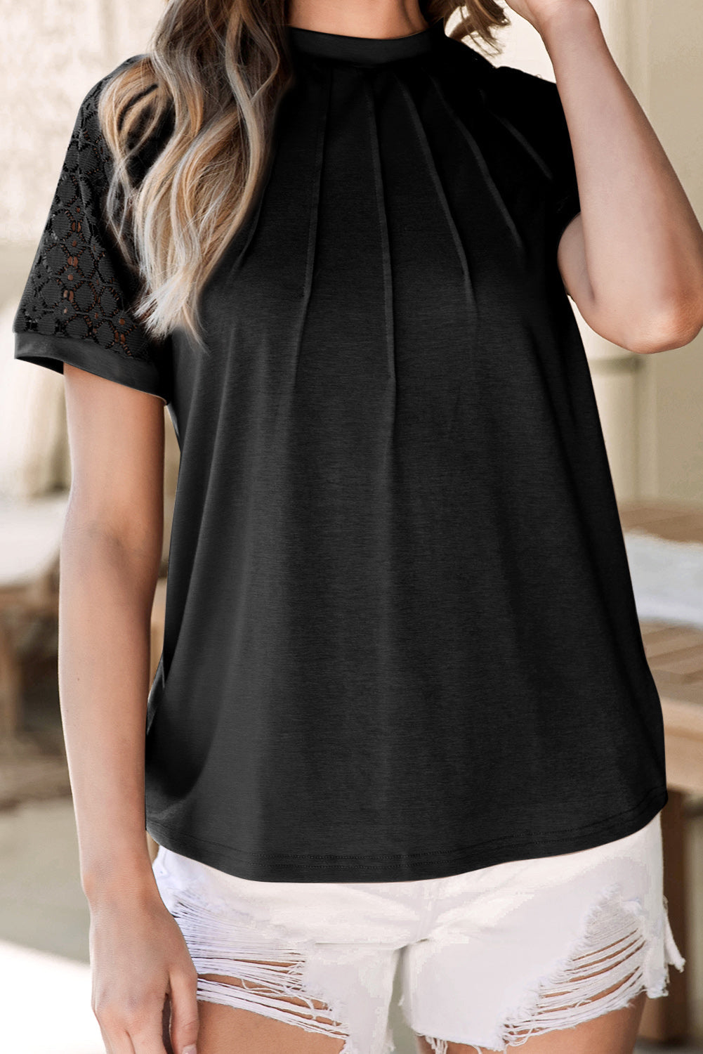 Navy blue tee with seamed detail and contrast lace raglan sleeves