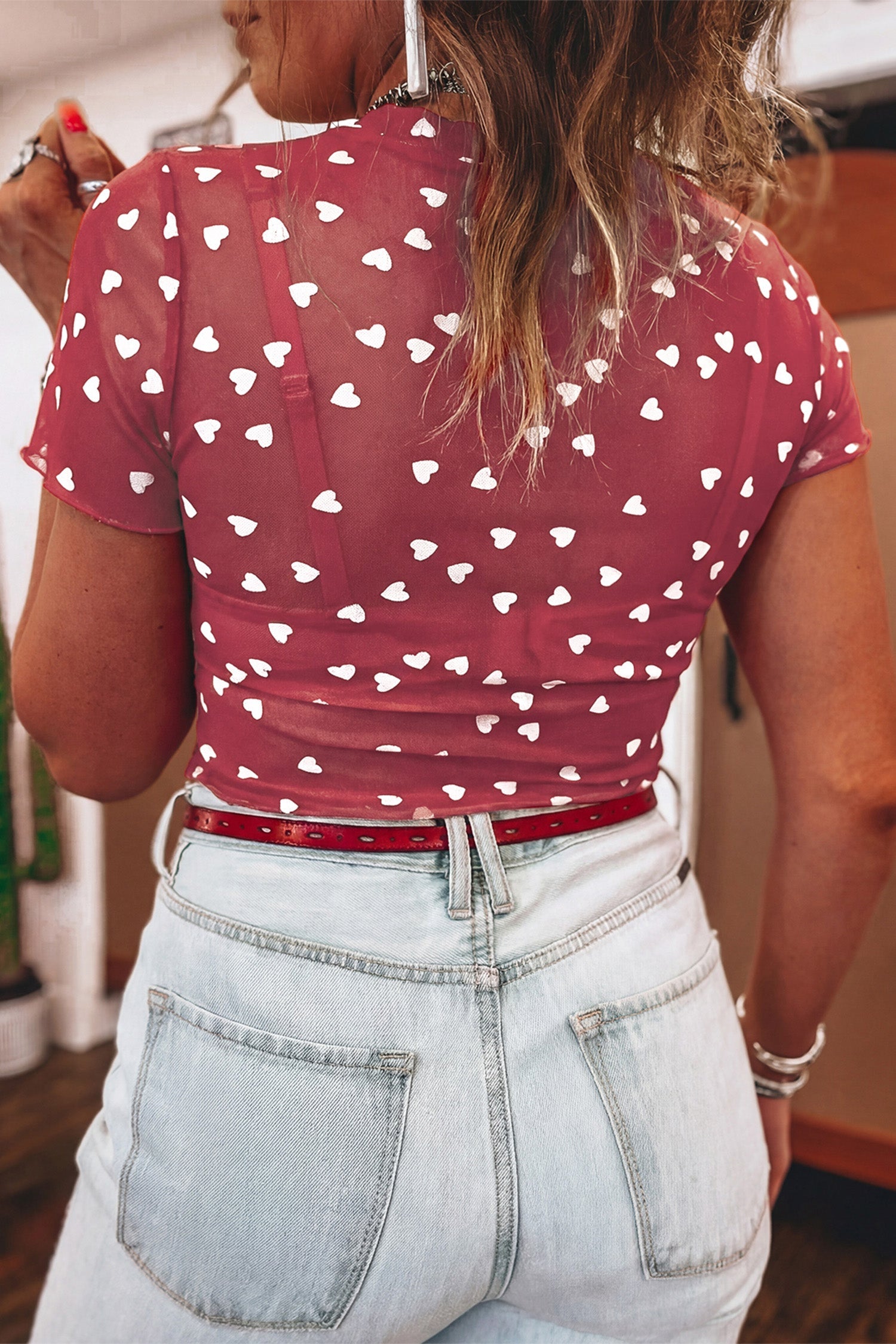 Pink mesh crop top with allover heart print and lettuce trim