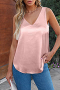 Pink deep V neck loose tank top with sleeveless design and relaxed fit