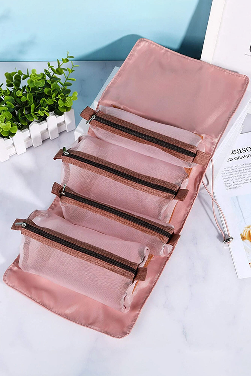 Pink Leegoo detachable 4-in-1 foldable makeup bag with embroidered design and customizable compartments