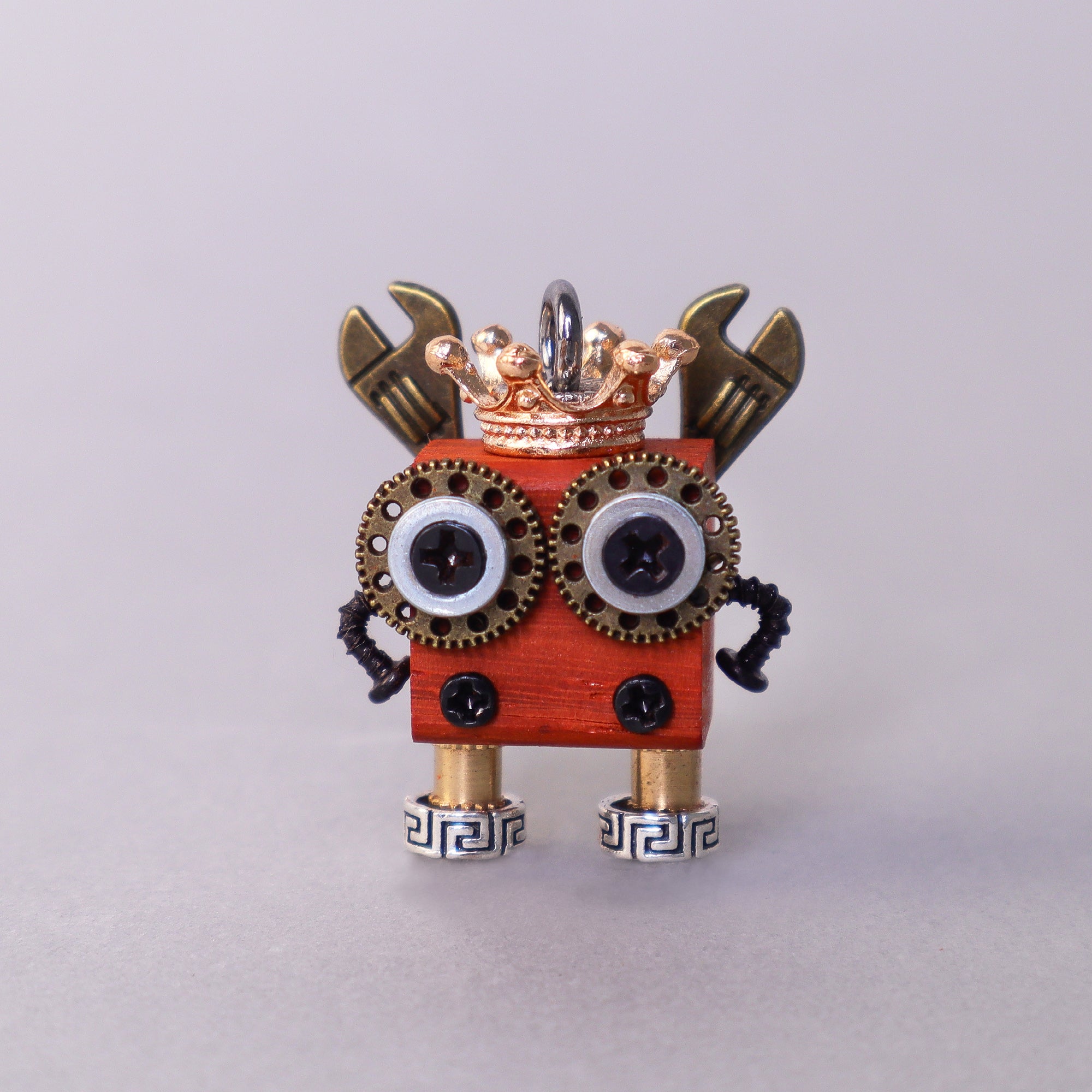 Handcrafted Wooden Bot necklace keychain and mini decor showing unique wooden robot designs