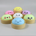 Pastel soft squish mystery dumplings in sealed blind box packaging