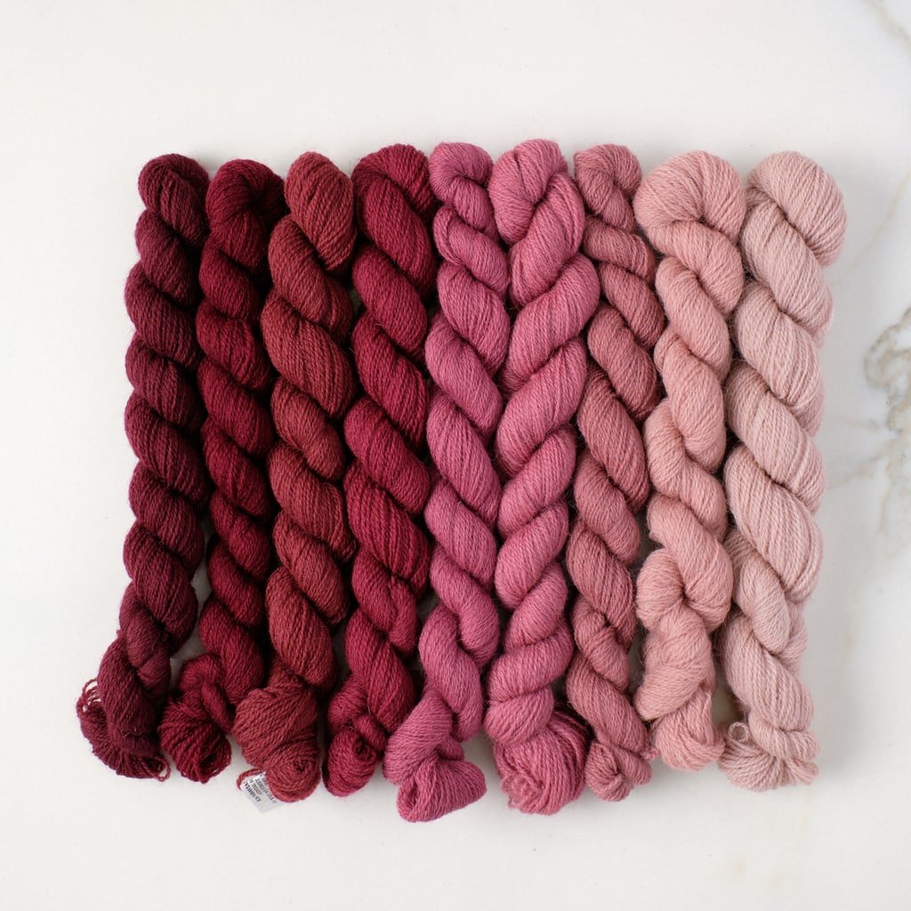 Appletons Wool Yarn Dull Rose Pink shades 141 to 149 skeins stacked