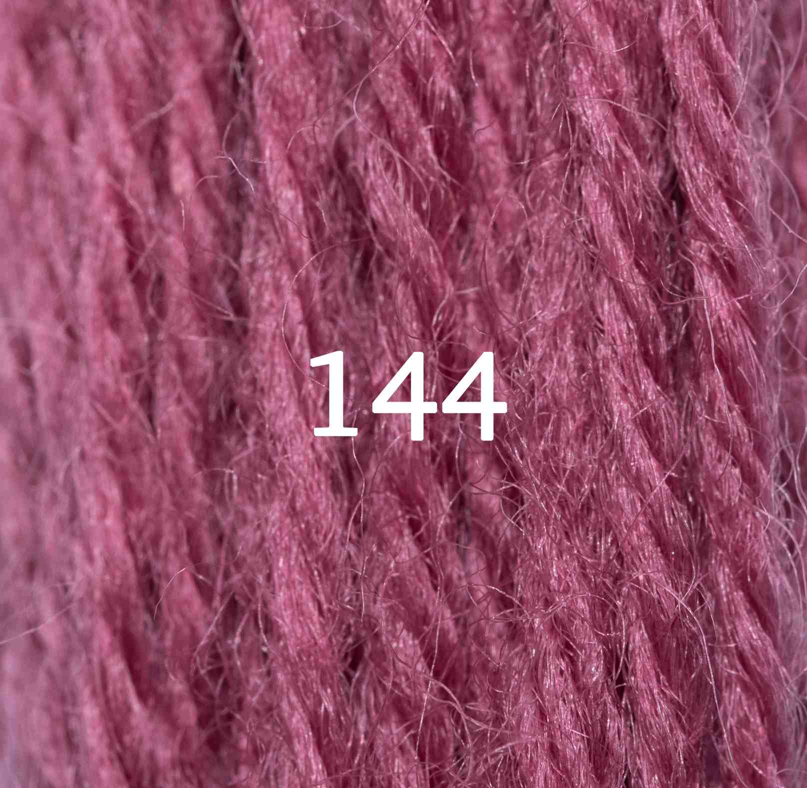 Skein of Appletons Wool Yarn in dull rose pink shade with soft texture and natural fibers