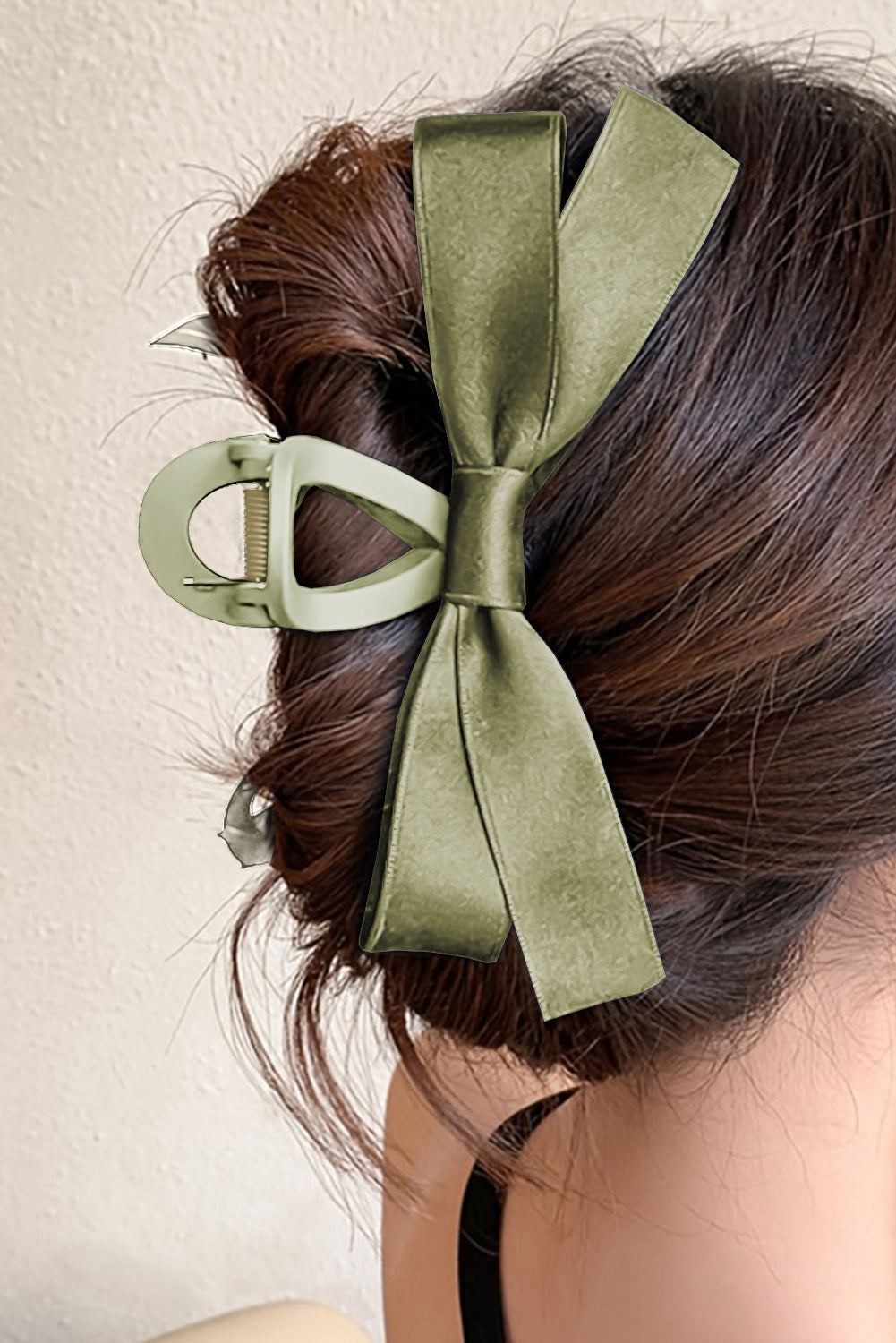 Large black bow decor hair claw clip for elegant hairstyle and secure hold
