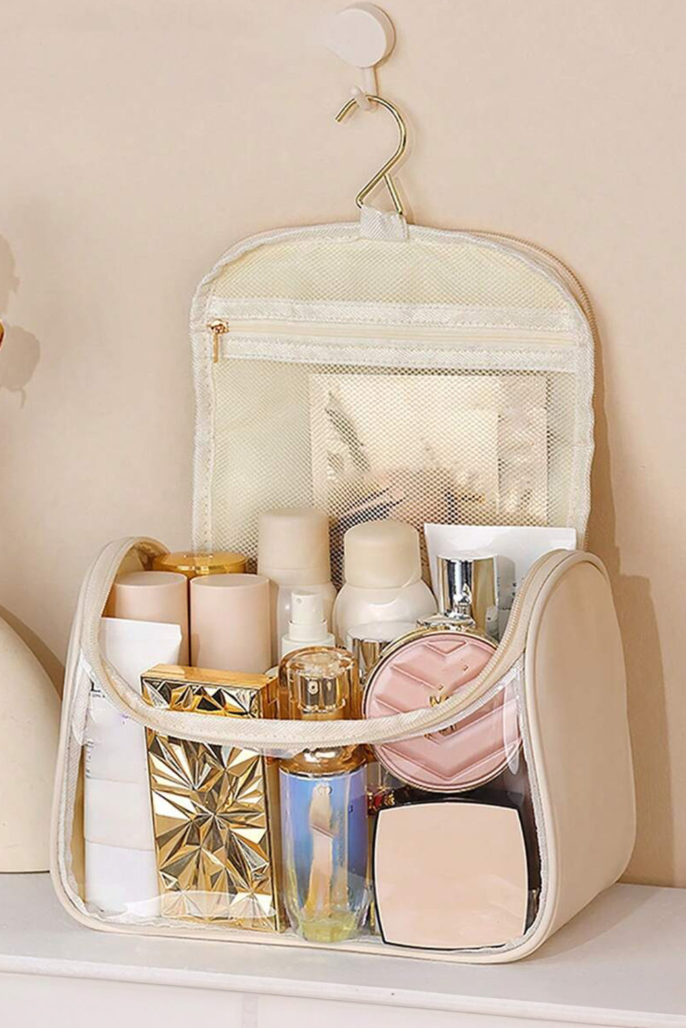 Beige clear makeup bag with TASTY print and handle, featuring inside pocket for storage