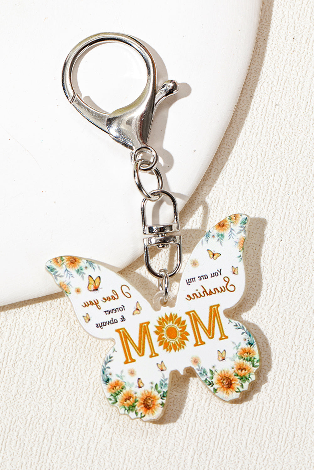Yellow MOM butterfly shape acrylic keychain with elegant design and bold font